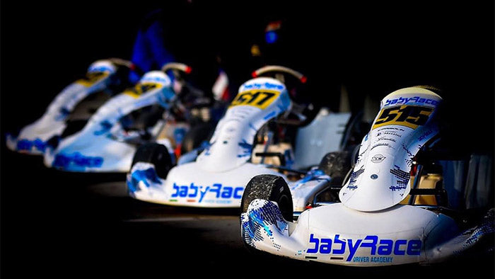Babyrace karts in a line all with custom white & blue chrome graphics designed by Kartdavid